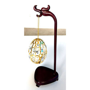 sparkle ball ornament hanging on dragon hook
